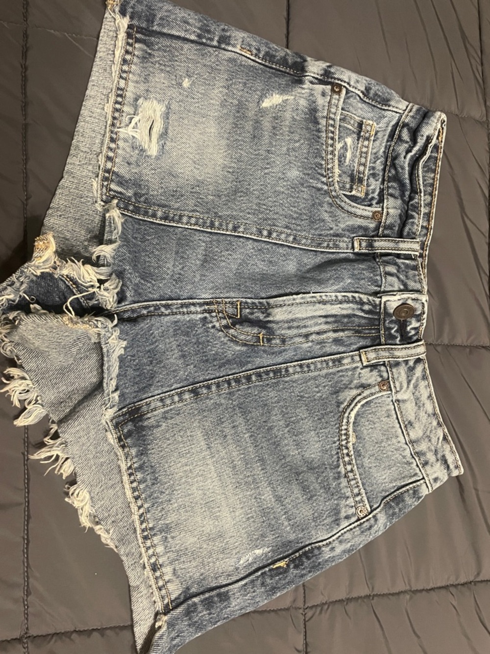 High-Waist Distressed Denim Shorts in Light Blue